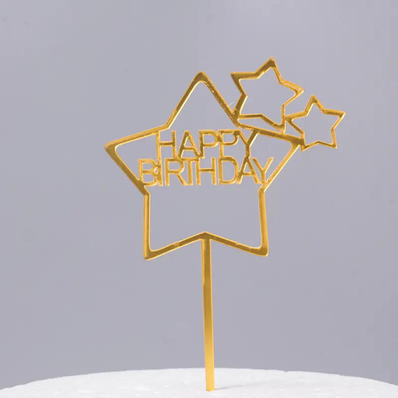 Golden star shaped happy birthday cake topper