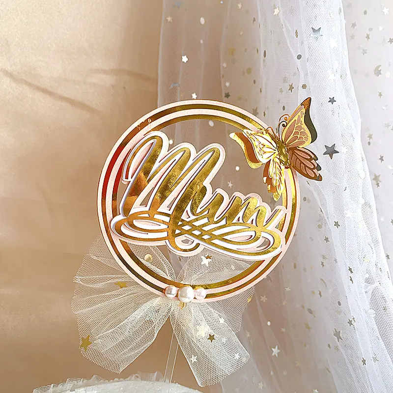 Mom with butterfly cake topper