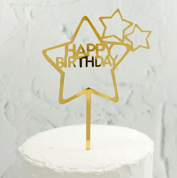 Golden star shaped happy birthday cake topper