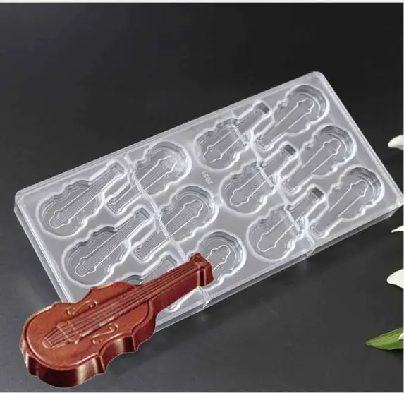 Polycarbonate 12 Cavities Musical Violin Guitar Shape Chocolate Mold (Output Weight Approx: 15 Grams Per Cavity)