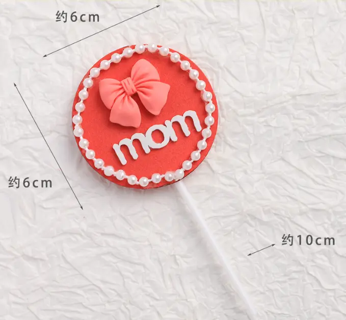 Mom with bow with pearl boarder cake topper