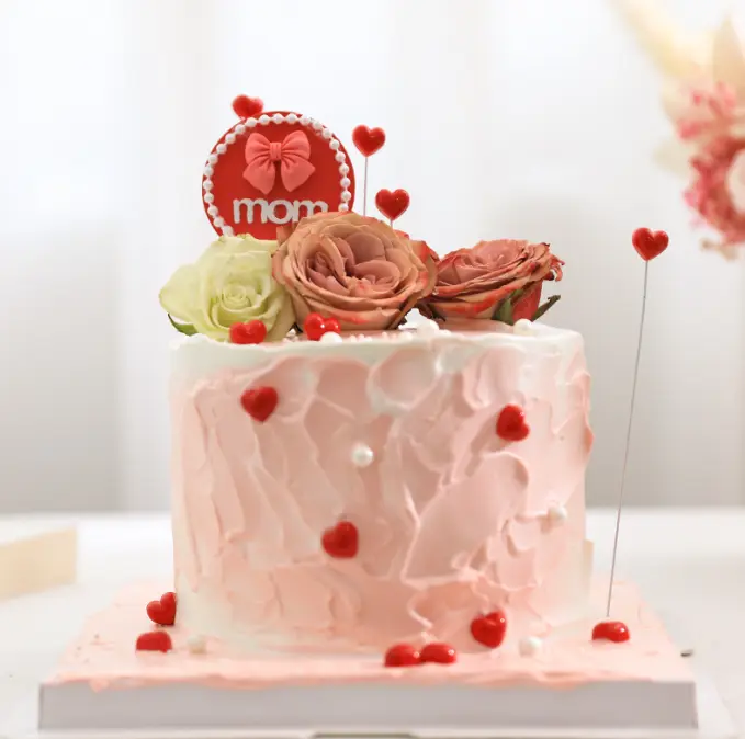 Mom with bow with pearl boarder cake topper