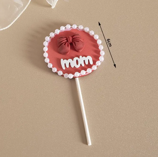Mom with bow with pearl boarder cake topper