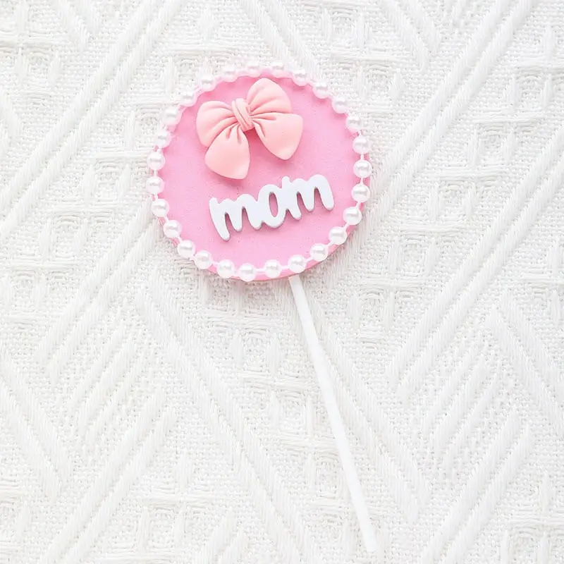 Mom with bow with pearl boarder cake topper